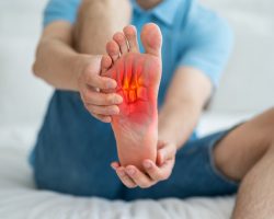 Joint diseases, hallux valgus, plantar fasciitis, man's leg hurts, pain in the foot, health problems concept